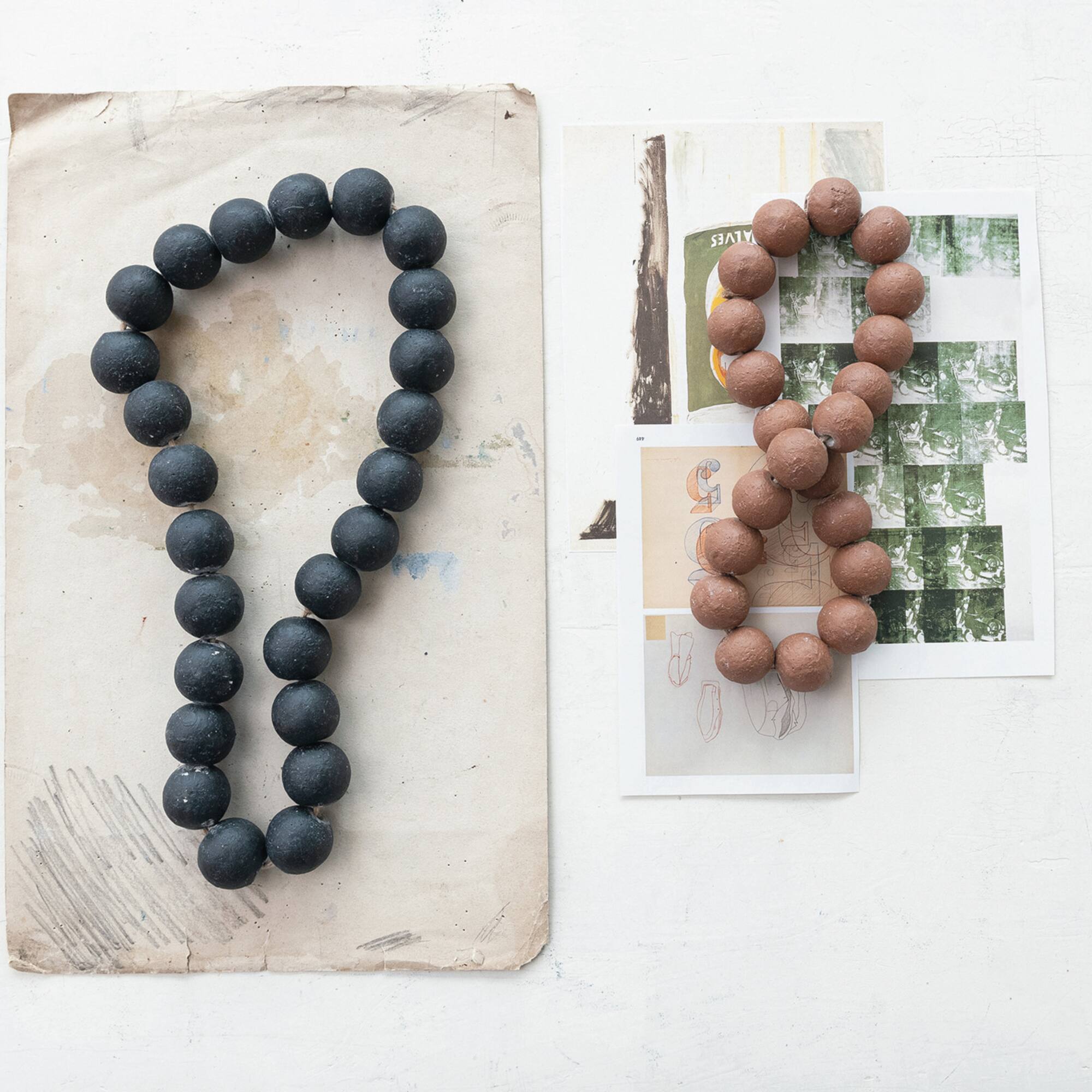 Hello Honey® 16.5" Distressed Black Cement Bead Garland